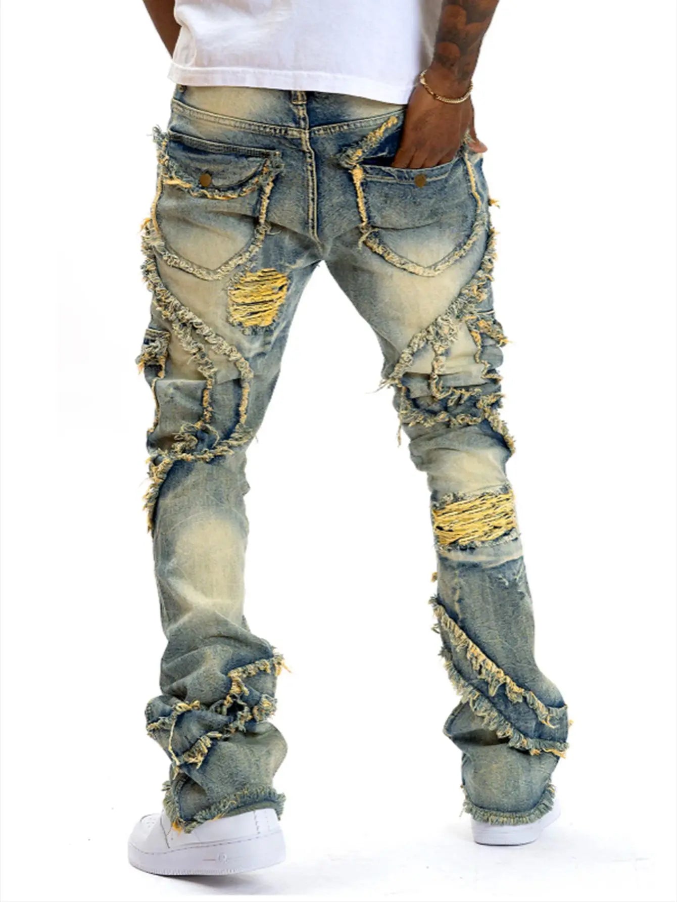 Retro ripped hole slightly flared tassel elastic jeans