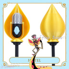 A pair of gold teardrop-shaped garden stakes with vintage-style microphone designs on the left and solid gold teardrop shapes on the right, set against a white background with a decorative border and a cartoon fairy graphic.