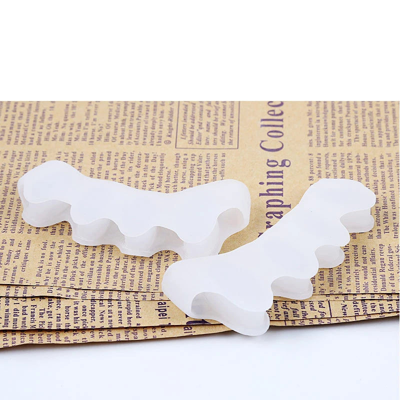 2 soft touch silicone toe spacer
