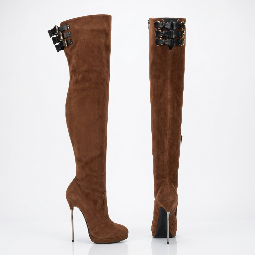 A pair of brown faux-suede thigh-high boots with high stiletto heels, side zippers, and decorative black buckle straps near the top, shown against a plain white background with a faint store watermark.