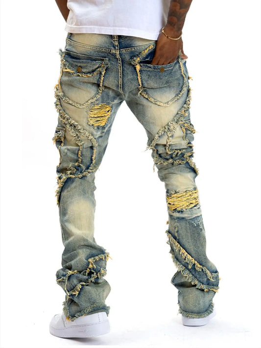 Retro ripped hole slightly flared tassel elastic jeans