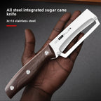 A hand holding a stainless steel sugar cane peeler knife with a dark brown wooden handle. The image features text overlays on the top left reading 'All steel integrated sugar cane knife' and '3cr13 stainless steel', set against a dark textured background.