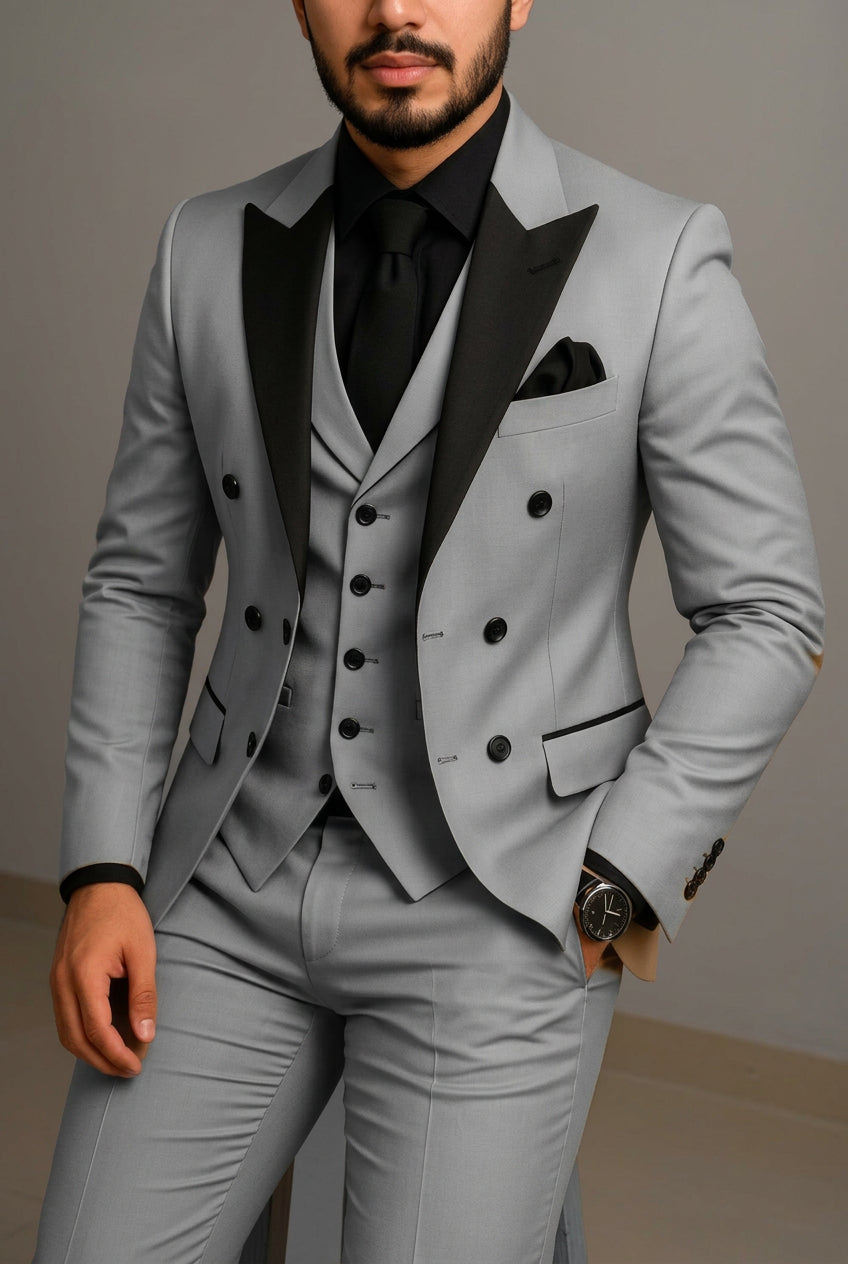 Man wearing a gray suit with a plain background, featuring text 'Classic Tailored Men Suit Store'.