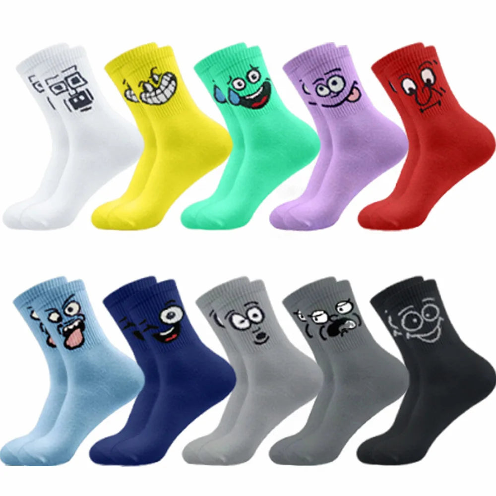 Set of colorful socks with cartoon face 